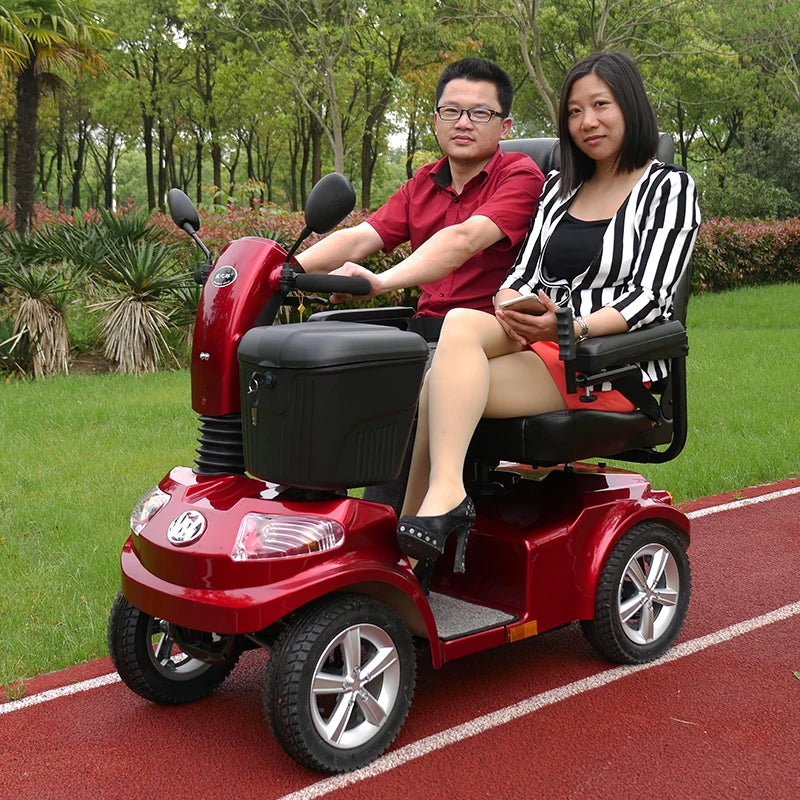 Elderly electric scooter with four wheels and two people can enter the elevator to pick up and drop off children. Disabled